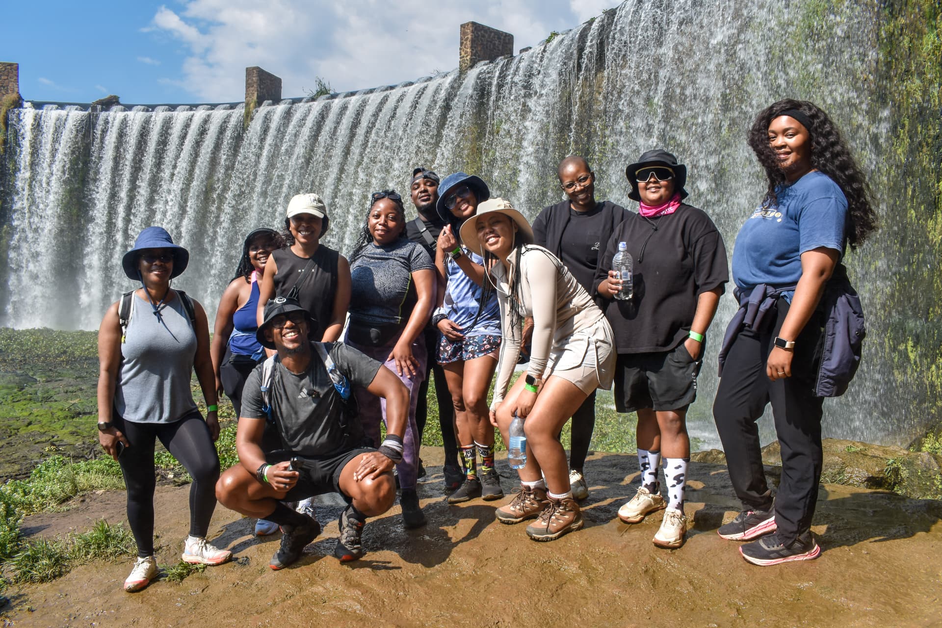 Sibling Thrivalry community at a waterfall
